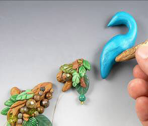 Peacock shape positioned with branch pieces